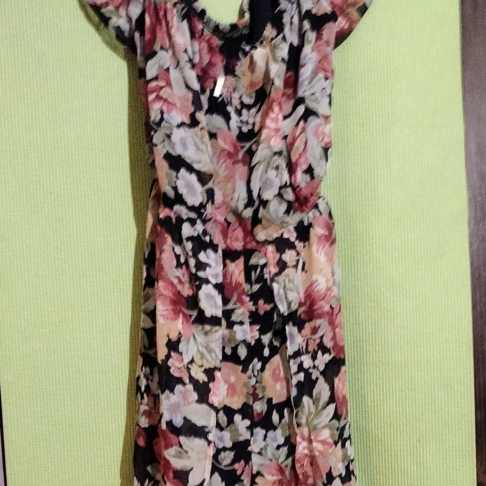 Brand New w|tags  Floral Romper inside< outer part and behind